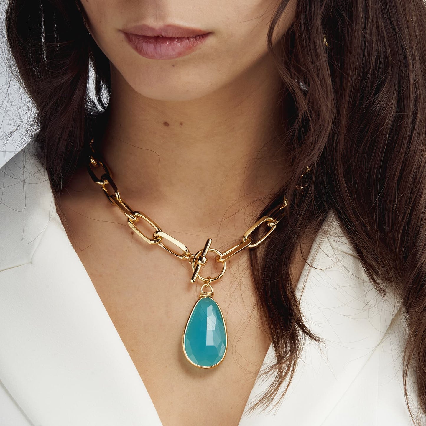 COLLANA UNOAERRE IN BRONZO DORATO CON CRISTALLO TURCHESE