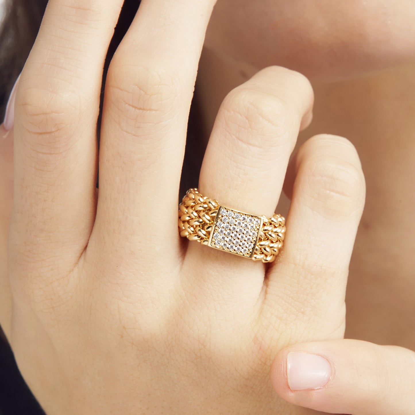 ANELLO UNOAERRE IN ARGENTO DORATO E ZIRCONI CHICCO