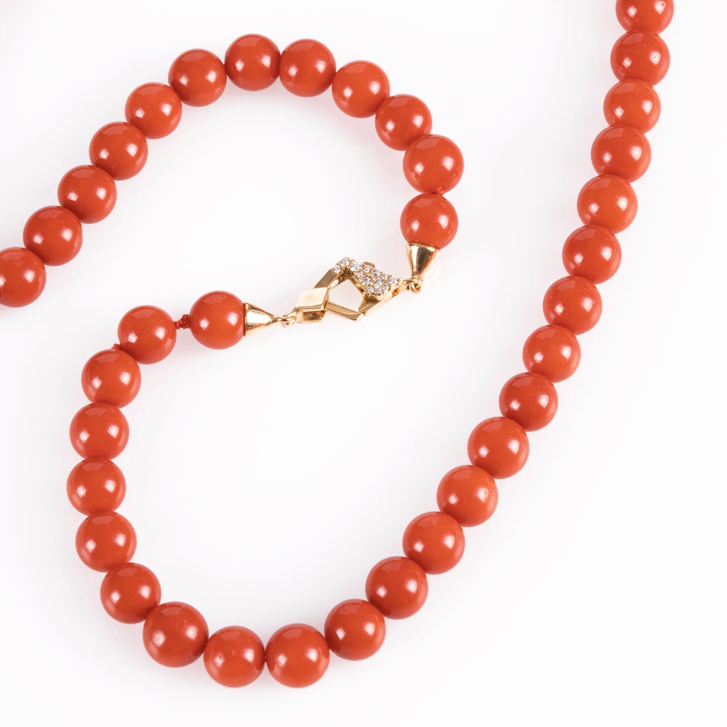 GOLD ART NECKLACE IN CORAL