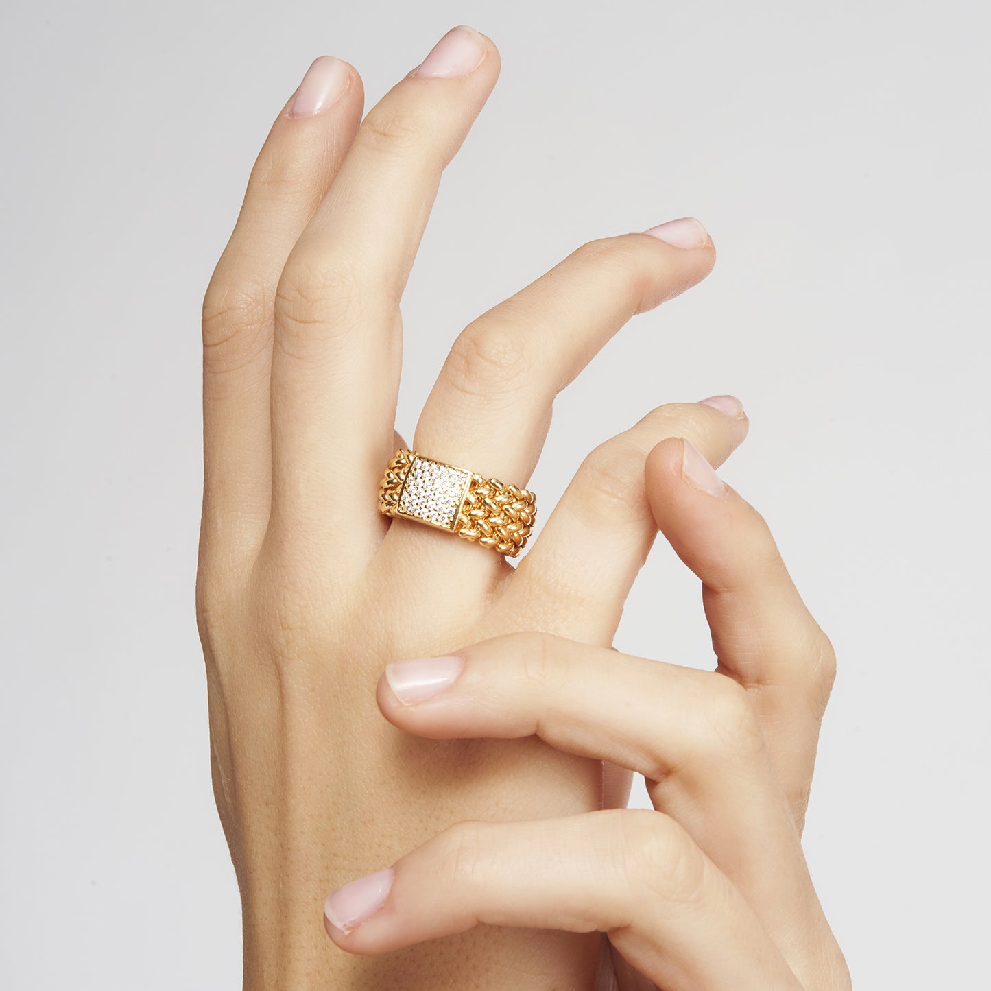 UNOAERRE RING IN GOLDEN SILVER AND CHICCO ZIRCONIA